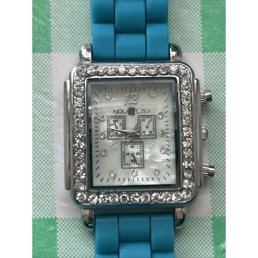 Nouveau Silver Tone Rhinestone Bezel Women’s Quartz Watch